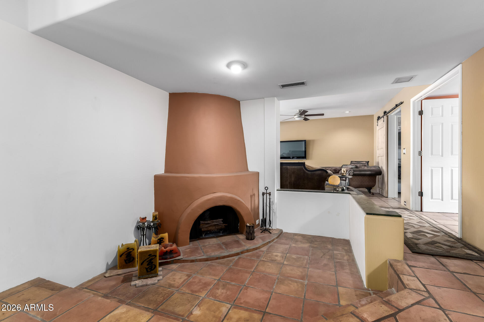 9012 South 47th Place Phoenix, AZ 85044 - Photo 9 of 54 a view of a livingroom with furniture and a fireplace