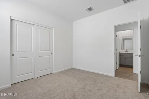 a view of a room with a wardrobe space