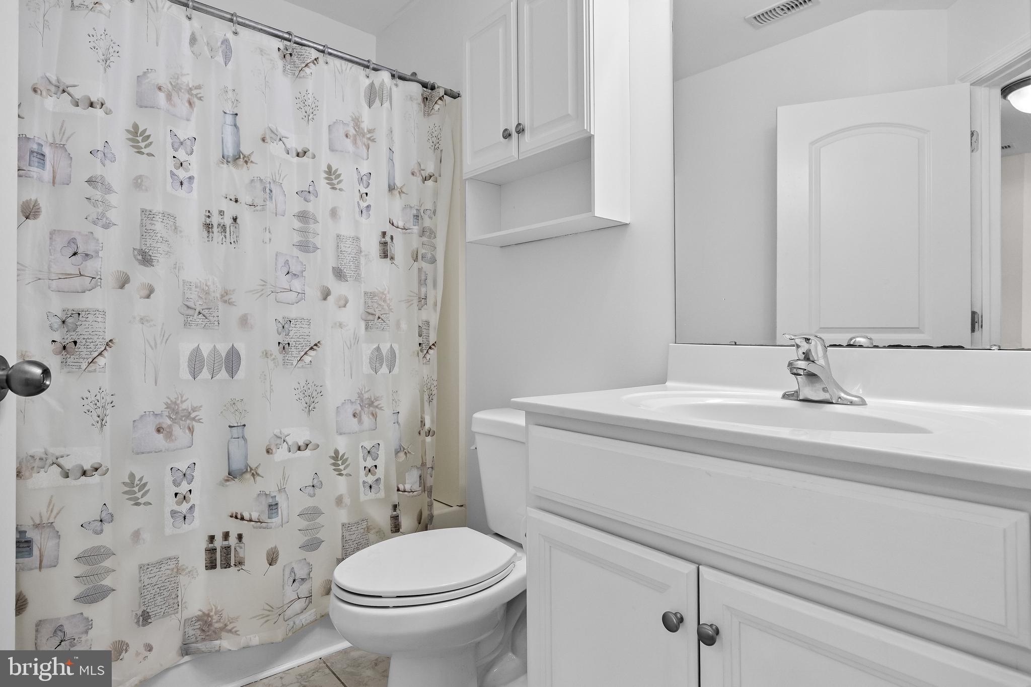 8 Iron Gate Road Sicklerville, NJ 08081 - Photo 20 of 33 a bathroom with a granite countertop toilet sink and mirror