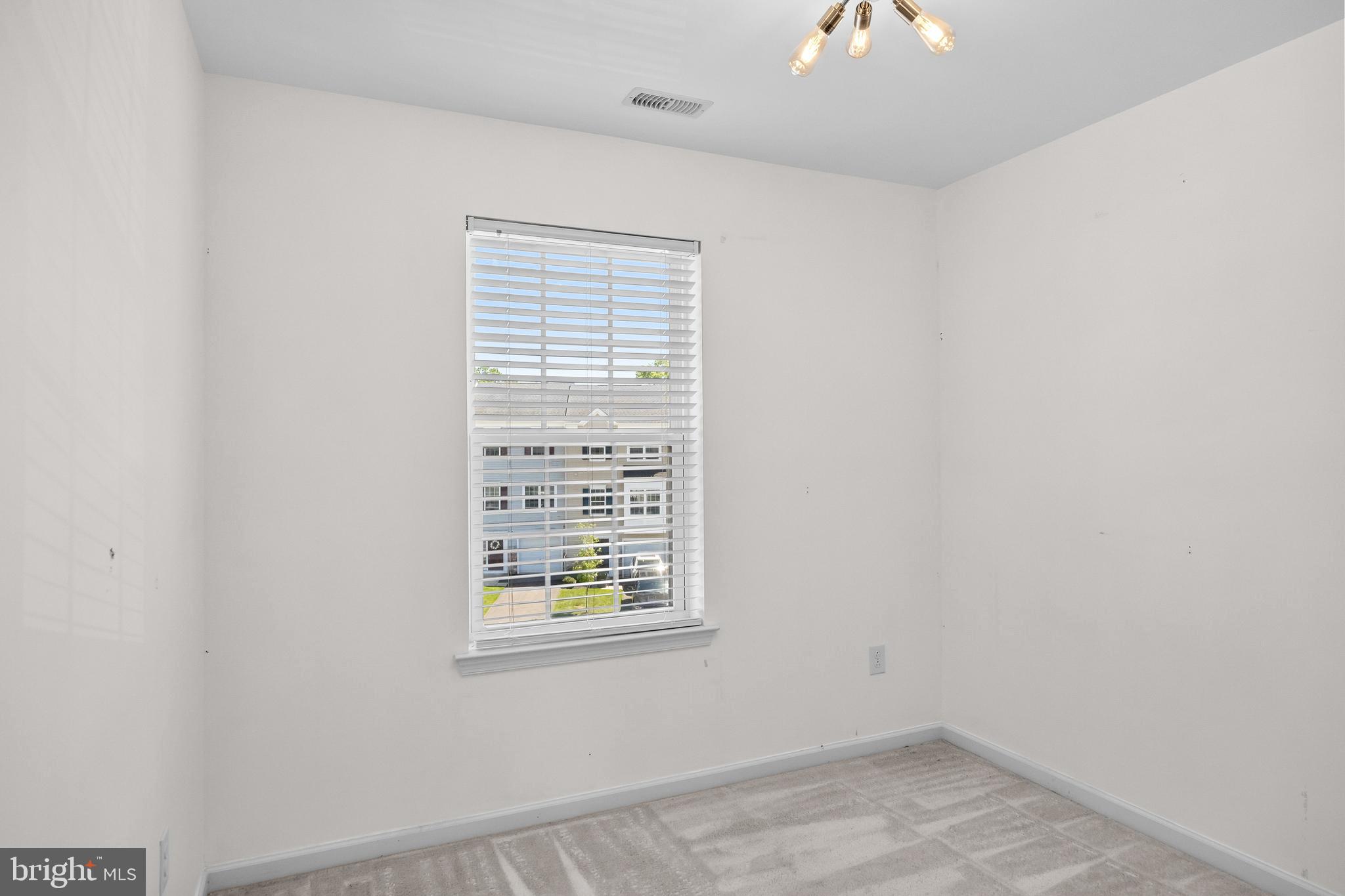 8 Iron Gate Road Sicklerville, NJ 08081 - Photo 25 of 33 an empty room with windows