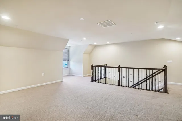 an empty room with a natural light