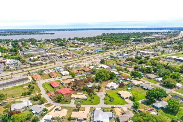 a view of city with ocean