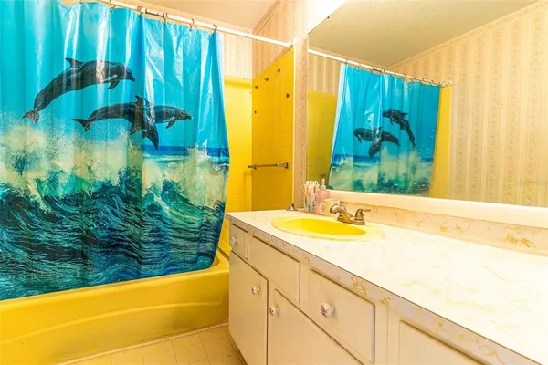 a bathroom with a sink and a bathtub