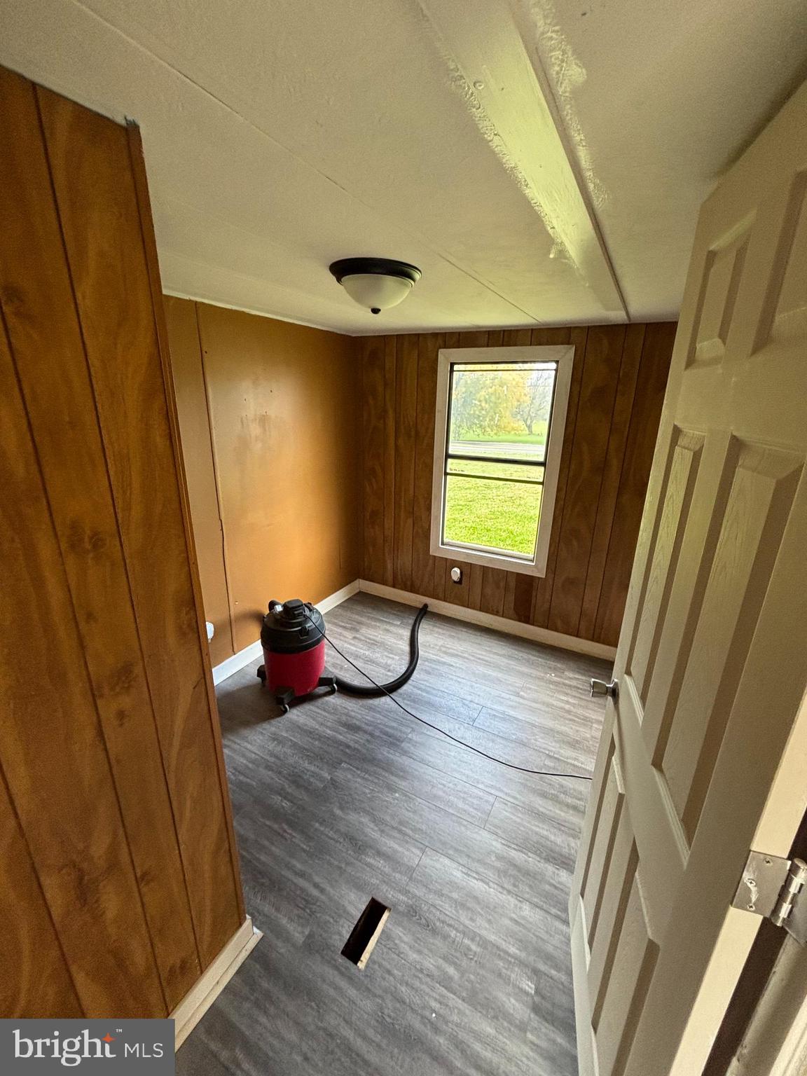 7078 Slabtown Road Waynesboro, PA 17268 - Photo 11 of 12 a view of a room with a wooden floor and furniture