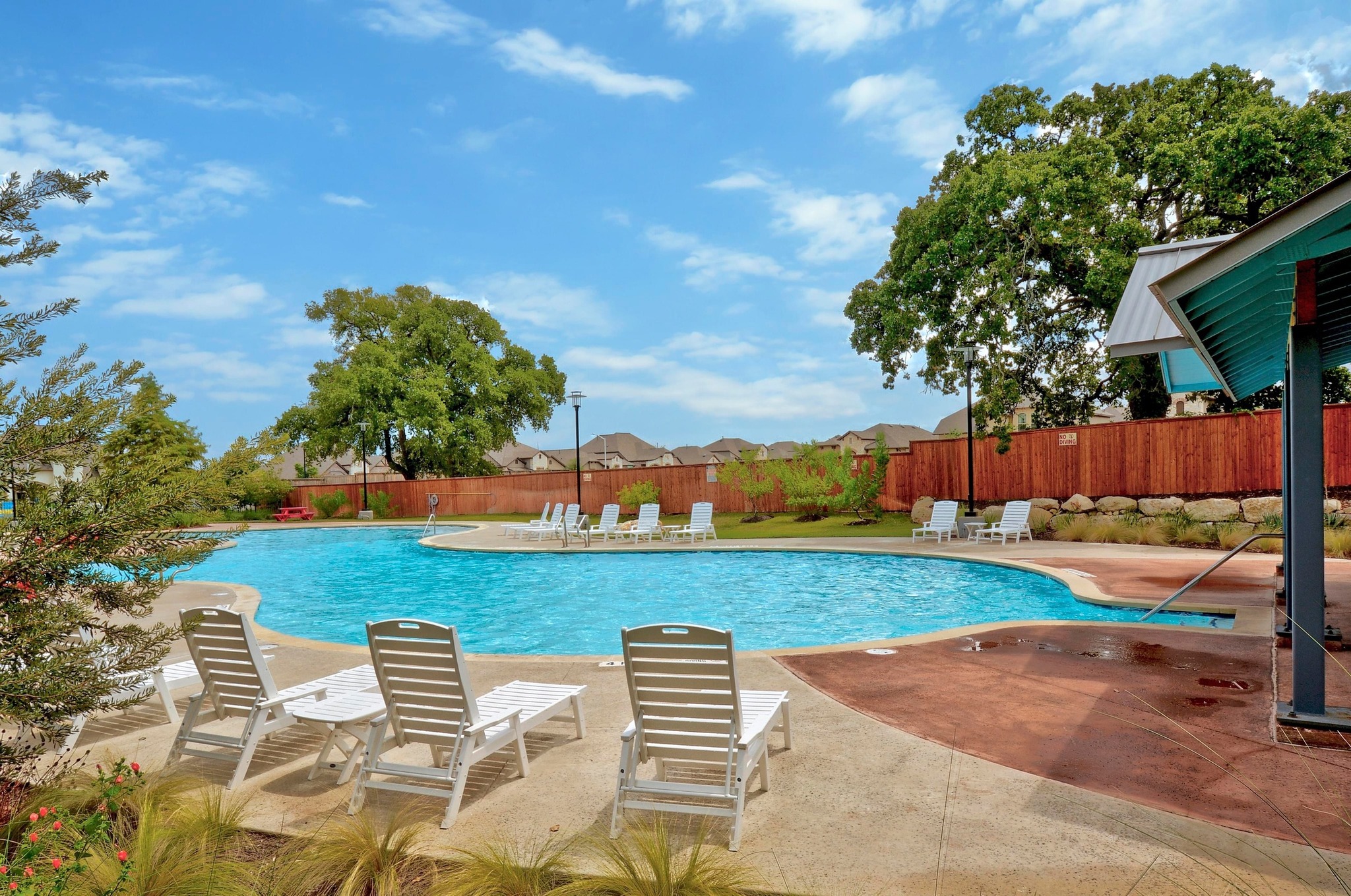 13009 Olivers Way Manchaca, TX 78652 - Photo 35 of 37 a view of a backyard and floor to ceiling of house
