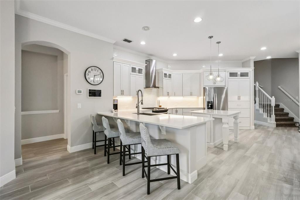 8350 Bowden Way Windermere, FL 34786 - Photo 16 of 45 a kitchen with a table and chairs in it