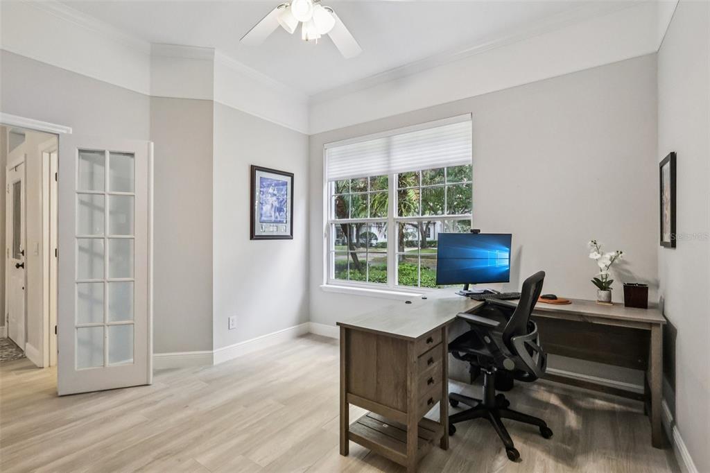 8350 Bowden Way Windermere, FL 34786 - Photo 25 of 45 a workspace with wooden floor and a window