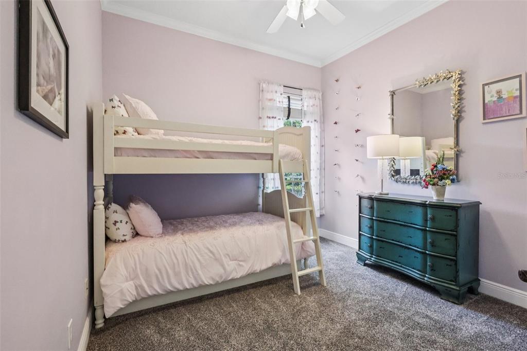 8350 Bowden Way Windermere, FL 34786 - Photo 33 of 45 a bedroom with a bed and a dresser