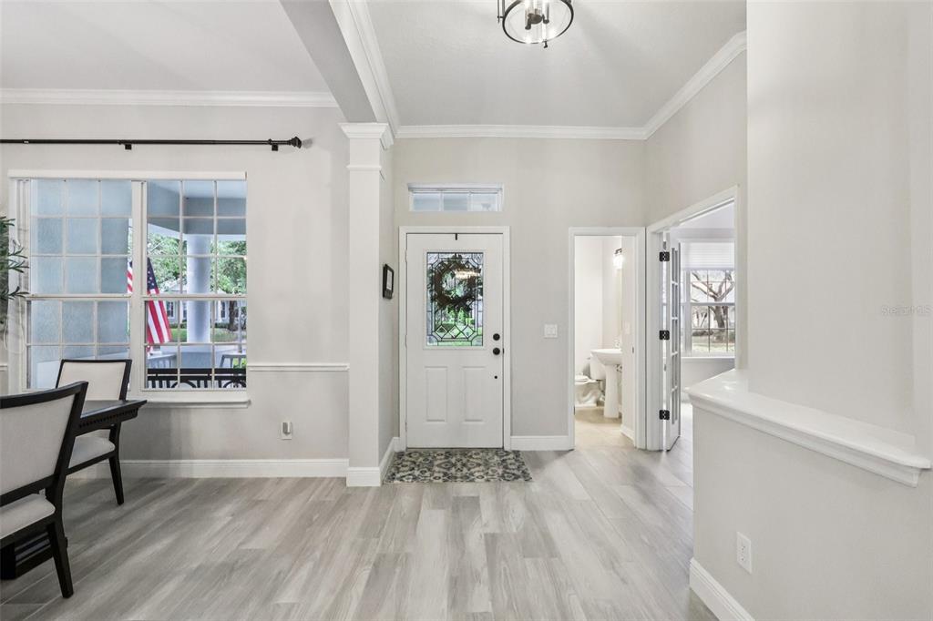 8350 Bowden Way Windermere, FL 34786 - Photo 5 of 45 a view of empty room with wooden floor and fan