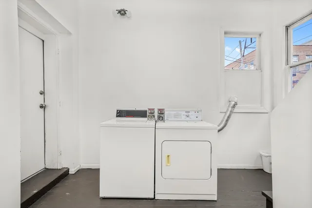 a utility room with dryer and washer