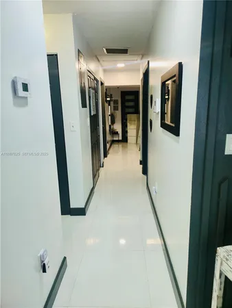 a view of gallery with hallway