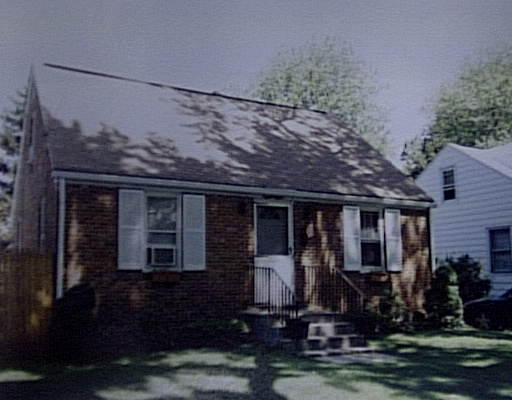 88 Huron Street Springfield, MA 01104 - Photo 1 of 1 a front view of a house with a yard