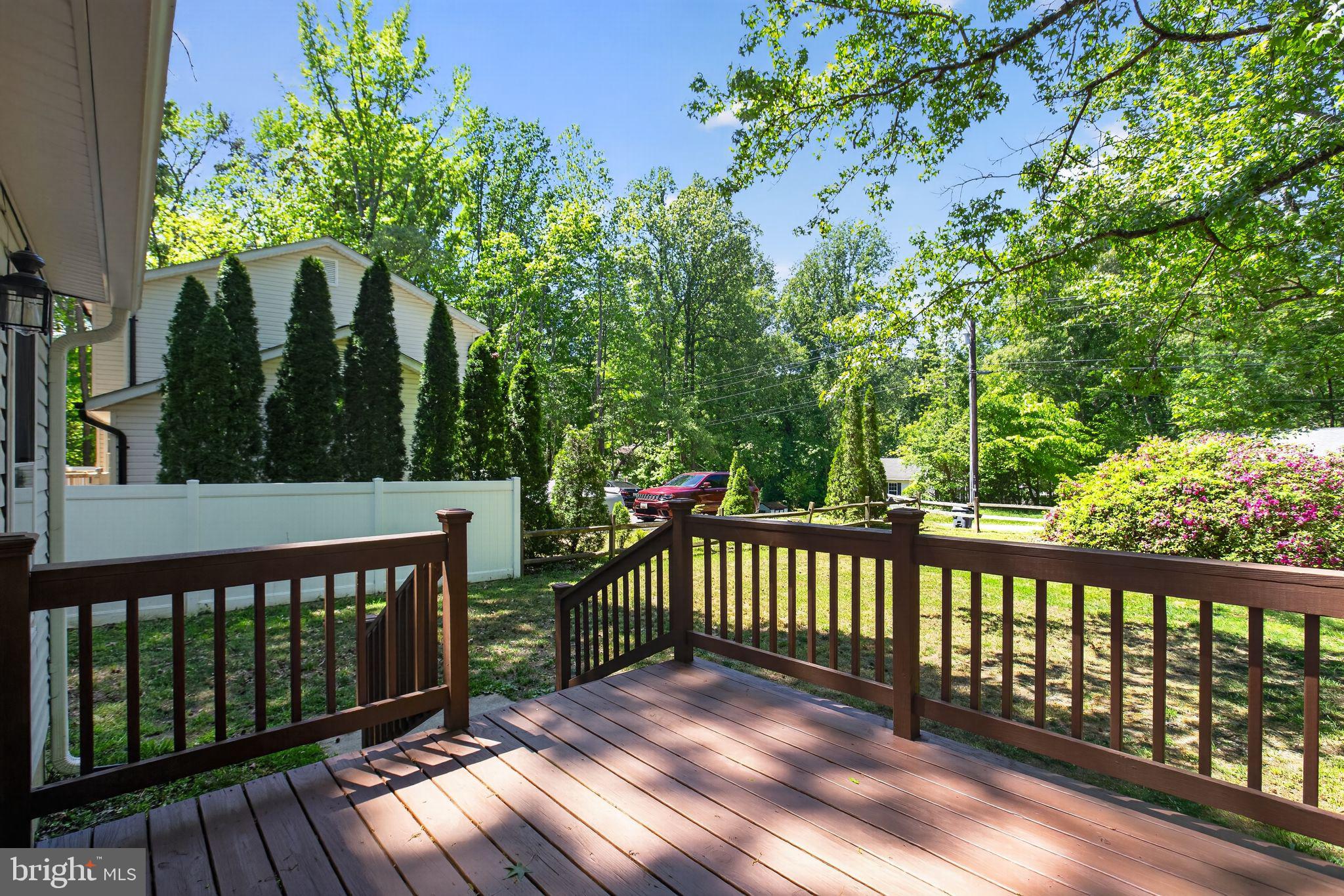 11789 Little Cove Point Road Lusby, MD 20657 - Photo 6 of 16 a view of a wooden roof deck