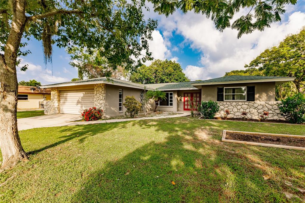 572 Linden Road Venice, FL 34293 - Photo 1 of 1 a front view of a house with swimming pool having outdoor seating