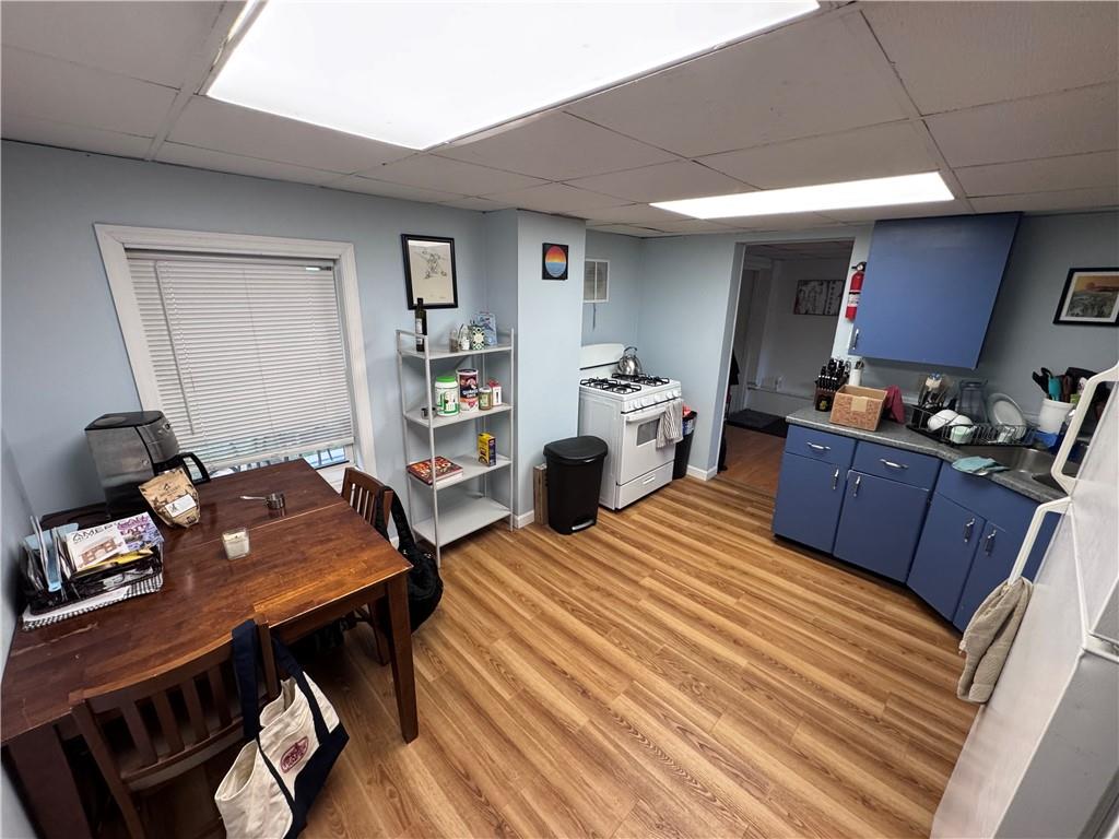 903 North Avenue, Unit 2 Pittsburgh, PA 15209 - Photo 10 of 13 a bedroom with furniture and a wooden floor