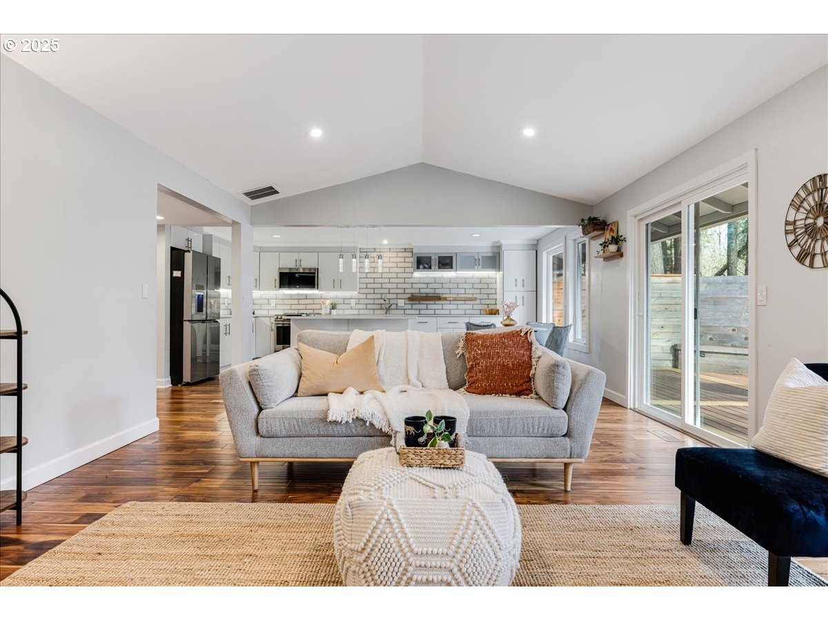 4268 Woodside Circle Lake Oswego, OR 97035 - Photo 15 of 44 a living room with furniture and a wooden floor