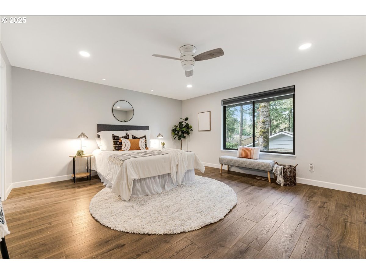 4268 Woodside Circle Lake Oswego, OR 97035 - Photo 18 of 44 a living room with furniture and a wooden floor