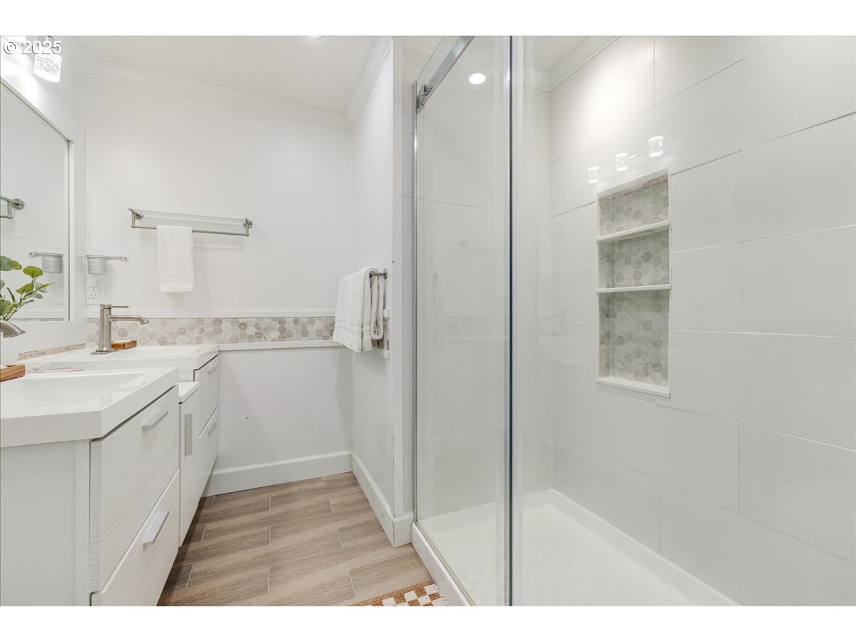 4268 Woodside Circle Lake Oswego, OR 97035 - Photo 22 of 44 a bathroom with a sink and a mirror
