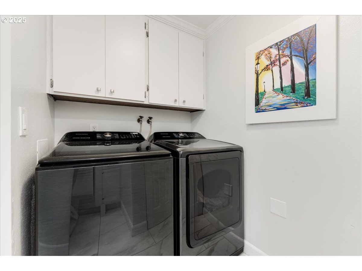 4268 Woodside Circle Lake Oswego, OR 97035 - Photo 27 of 44 a kitchen with stainless steel appliances granite countertop a stove and a microwave