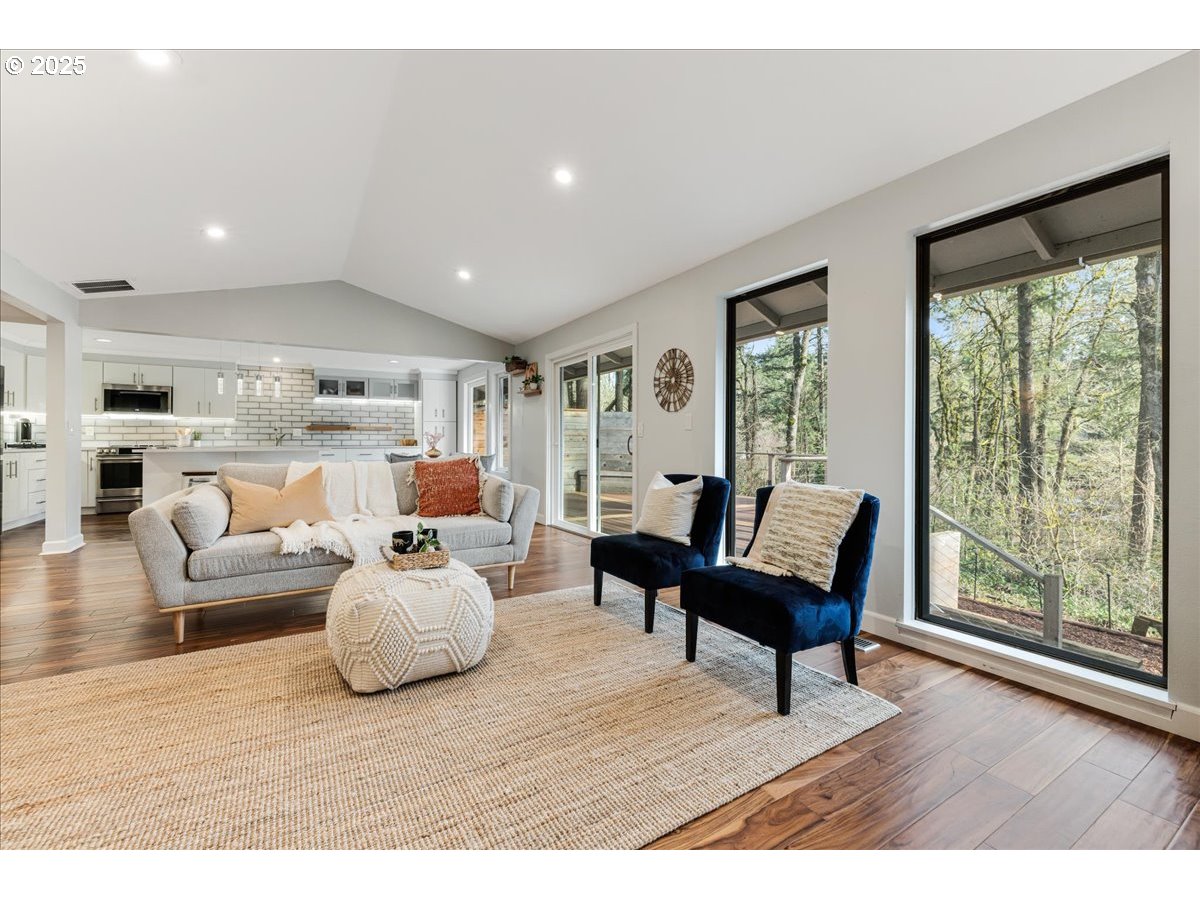 4268 Woodside Circle Lake Oswego, OR 97035 - Photo 4 of 44 a living room with furniture and a large window