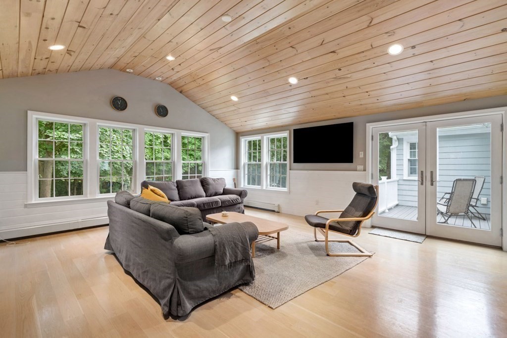 257 R Central Street Hingham, MA 02043 - Photo 1 of 23 a living room with furniture and a flat screen tv