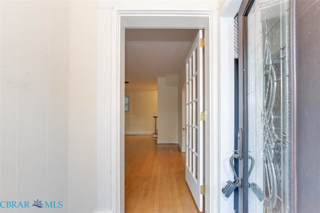 144 Meredith Street Hampton, VA 23669 - Photo 5 of 36 a view of a bathroom from a corridor