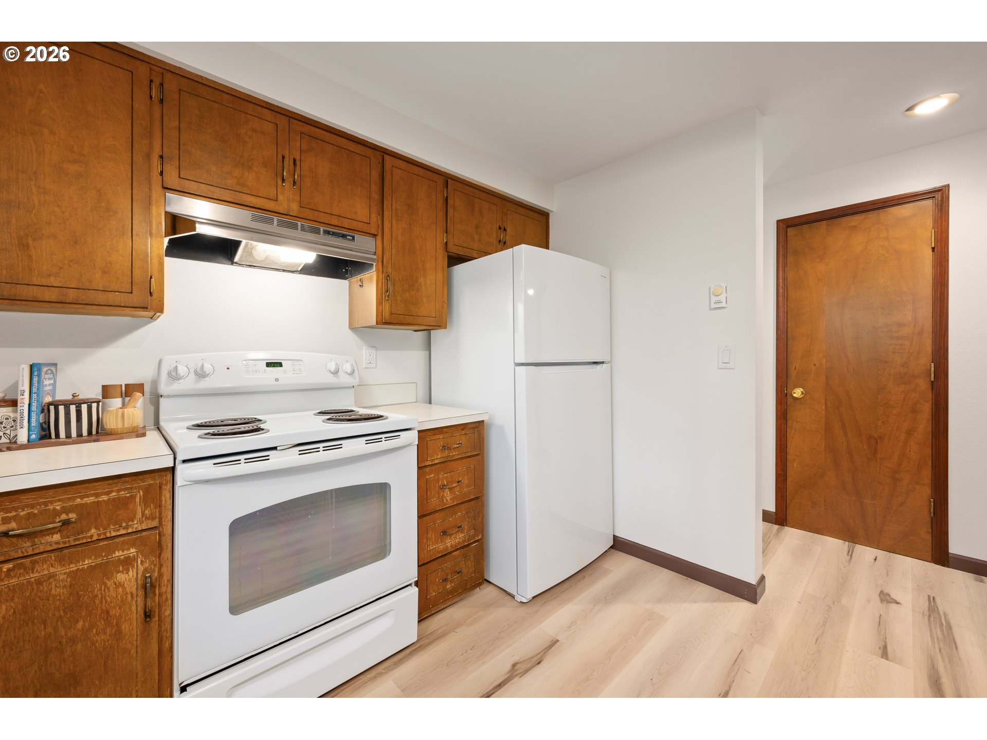 765 Sprague Street Eugene, OR 97405 - Photo 20 of 48 a kitchen with a stove a sink and a refrigerator