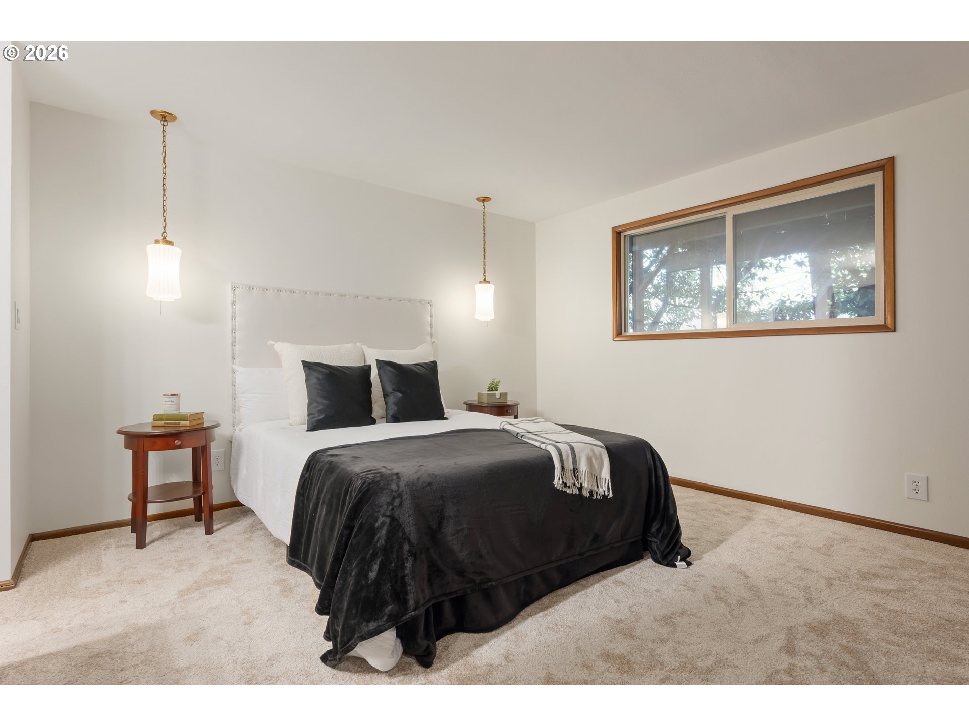 765 Sprague Street Eugene, OR 97405 - Photo 24 of 48 a bedroom with a bed and a painting on the wall