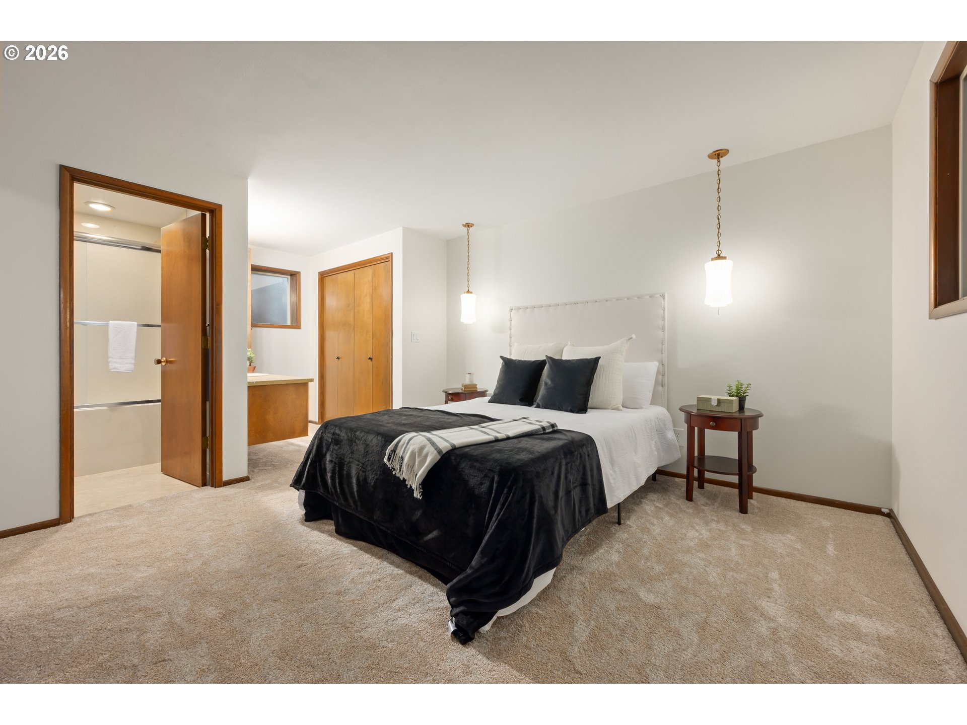 765 Sprague Street Eugene, OR 97405 - Photo 25 of 48 a bedroom with a bed and closet