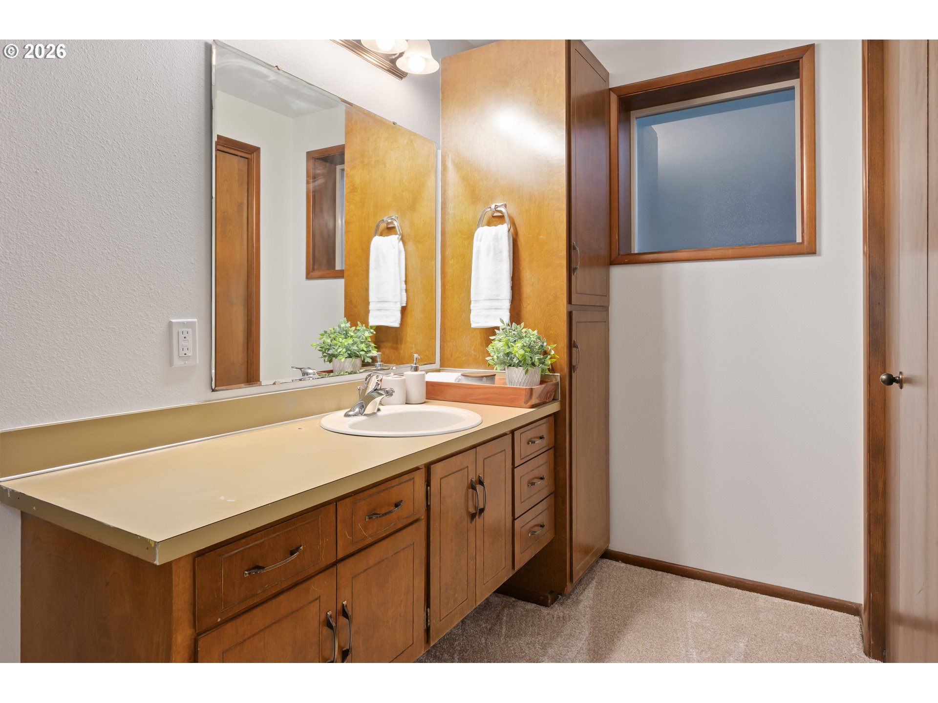 765 Sprague Street Eugene, OR 97405 - Photo 27 of 48 a bathroom with a sink and a mirror