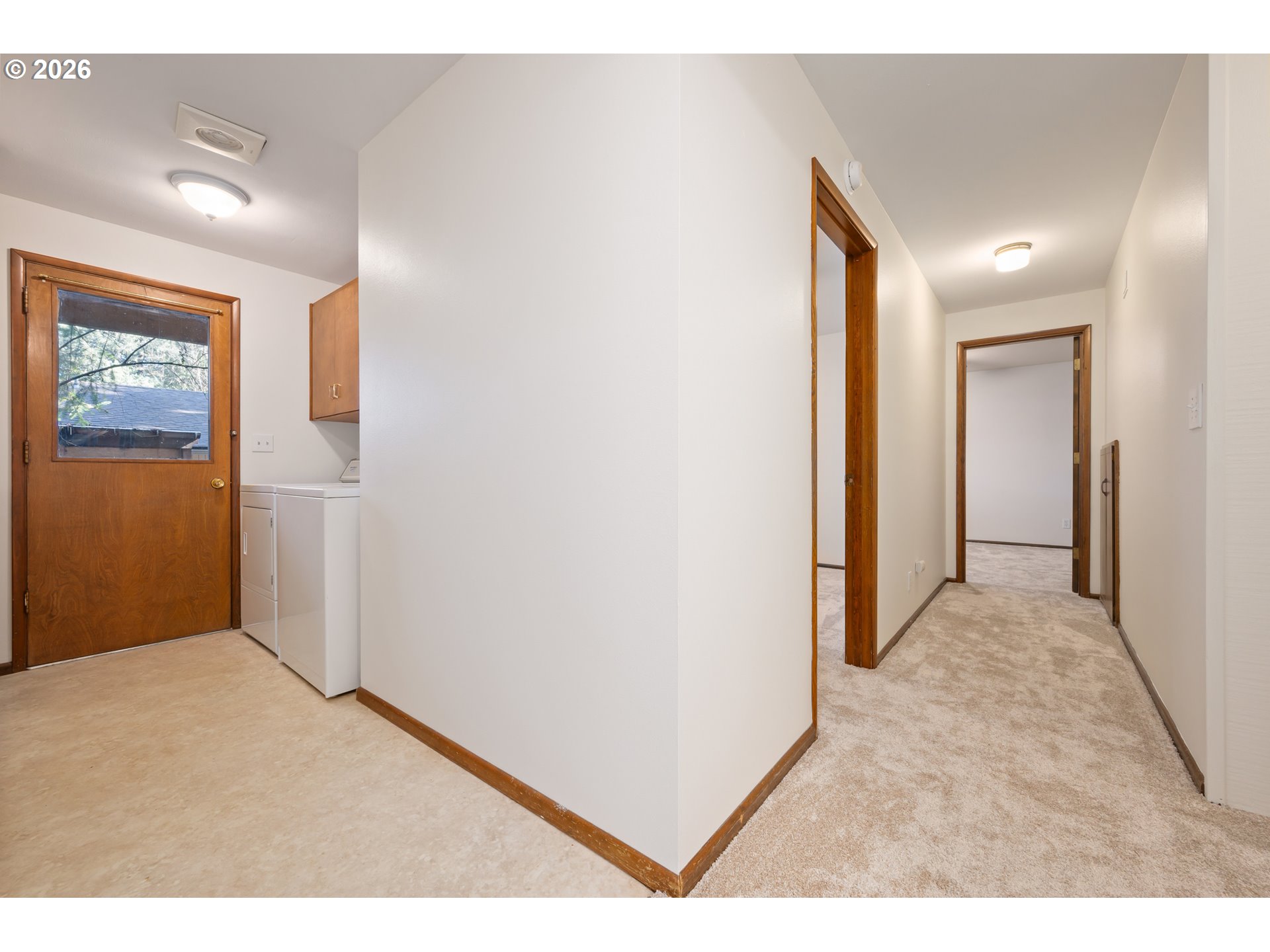 765 Sprague Street Eugene, OR 97405 - Photo 36 of 48 a view of a hallway to rooms