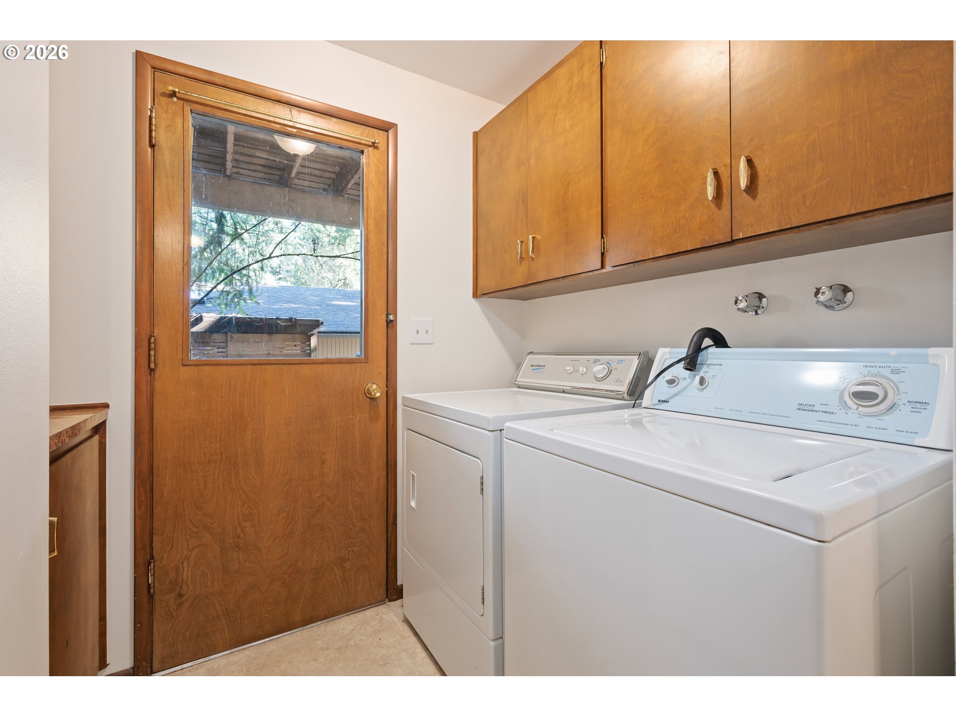 765 Sprague Street Eugene, OR 97405 - Photo 37 of 48 a utility room with dryer and washer