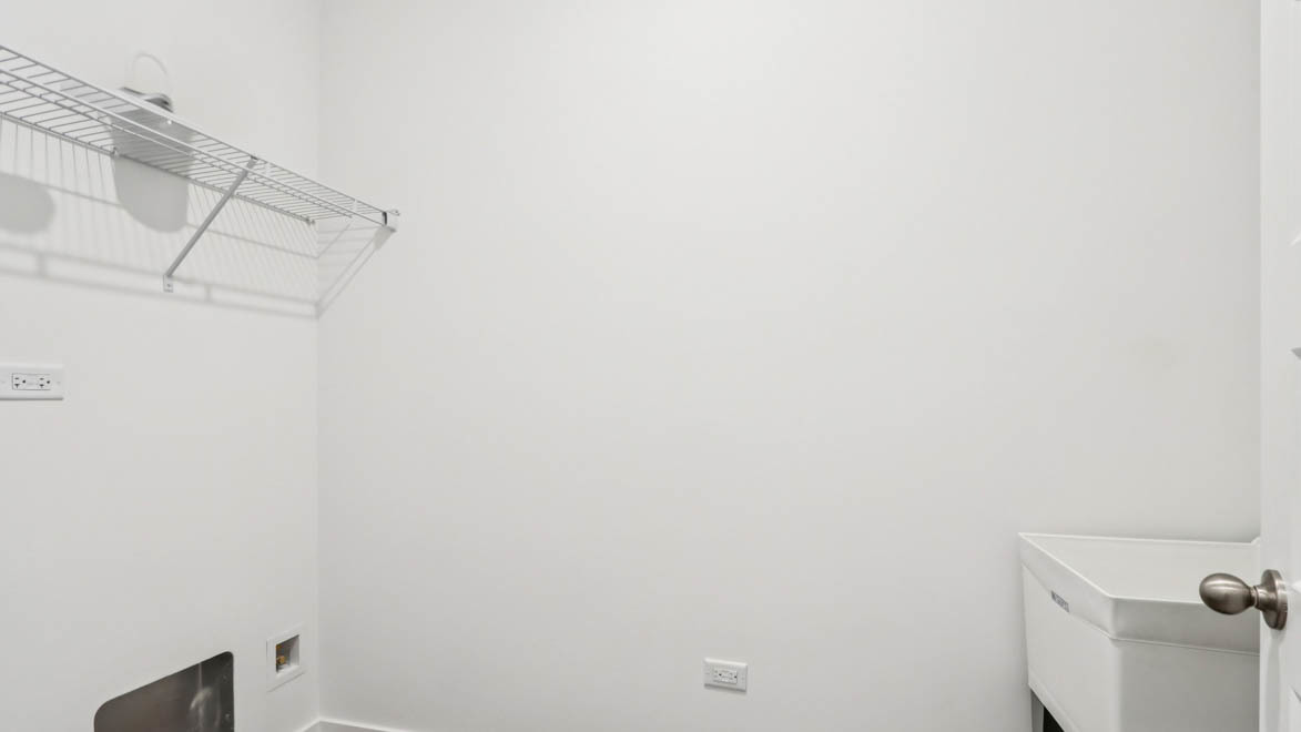 284 Snowdrop Lane Elgin, IL 60124 - Photo 17 of 33 a bathroom with a white wall and a toilet