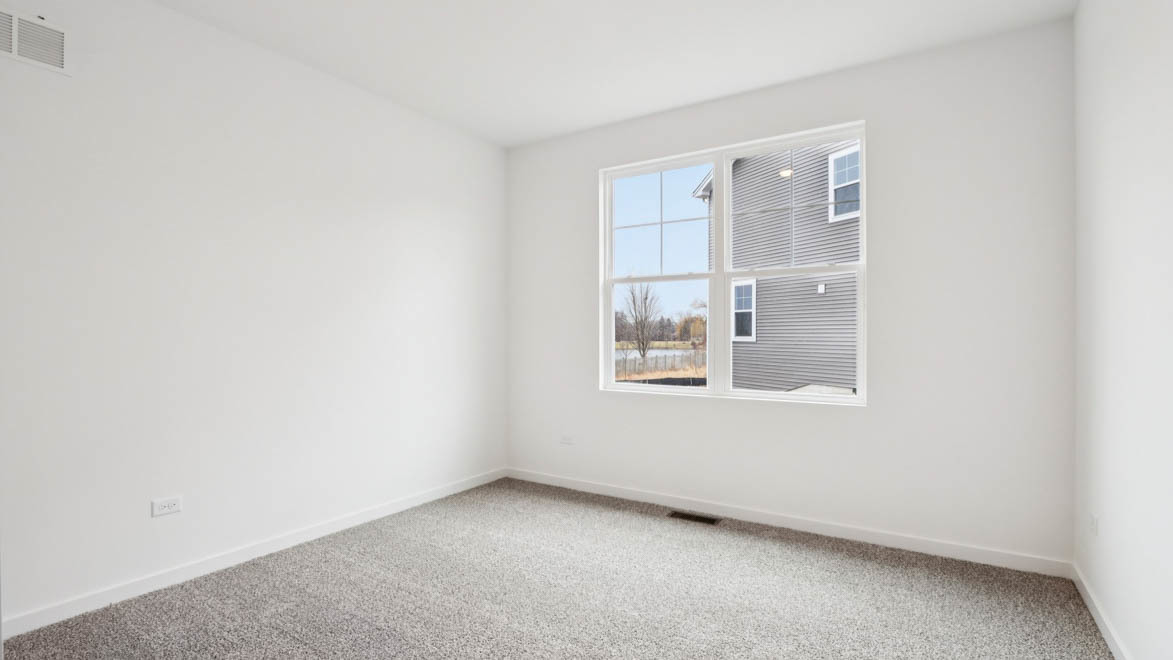 284 Snowdrop Lane Elgin, IL 60124 - Photo 18 of 33 an empty room with a window