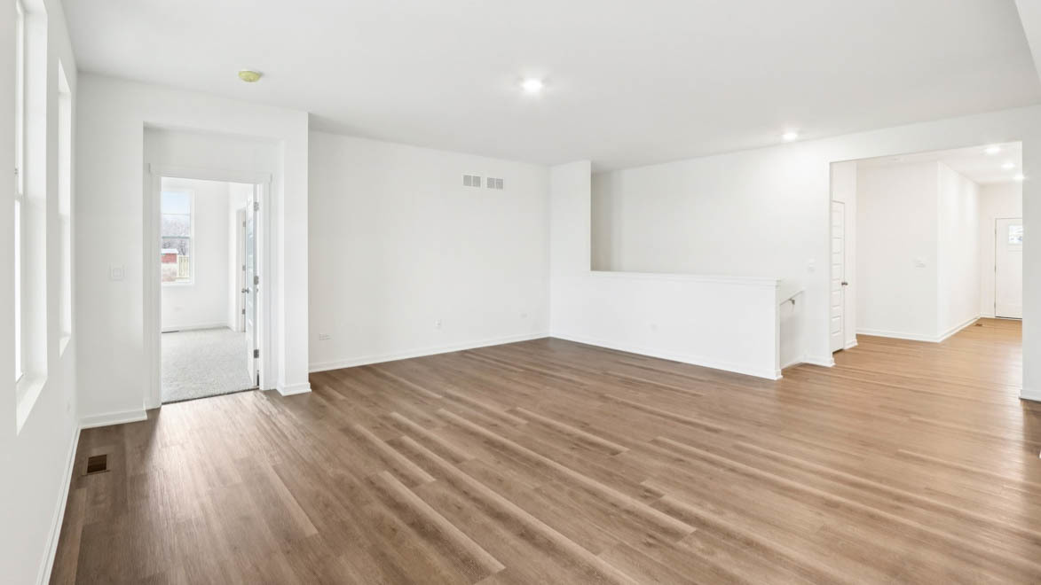 284 Snowdrop Lane Elgin, IL 60124 - Photo 2 of 33 a view of empty room with wooden floor