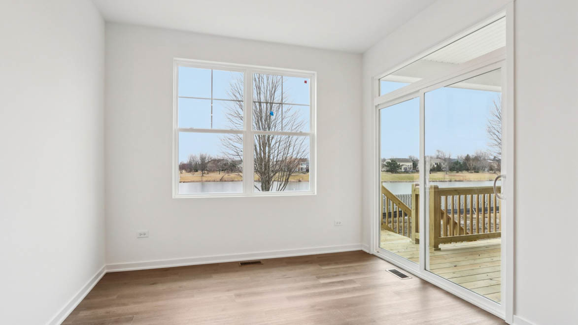 284 Snowdrop Lane Elgin, IL 60124 - Photo 22 of 33 an empty room with wooden floor and windows