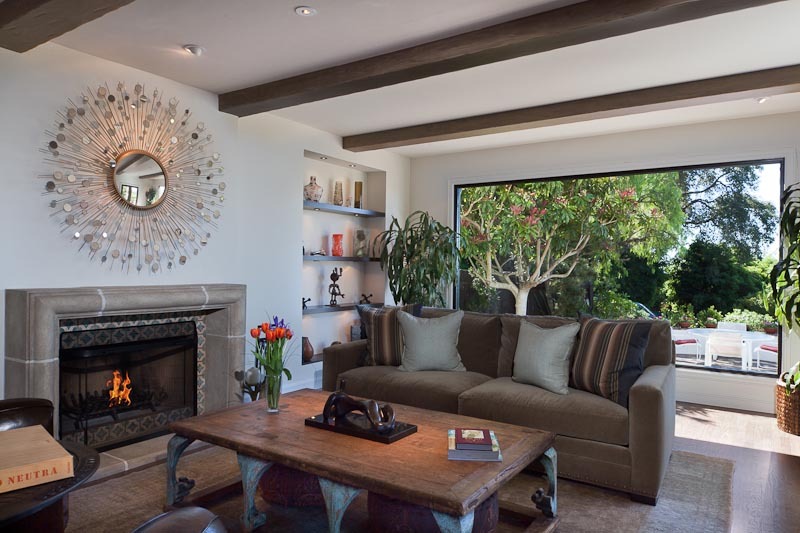 1021 Las Alturas Road Santa Barbara, CA 93103 - Photo 4 of 20 a living room with furniture and a fireplace
