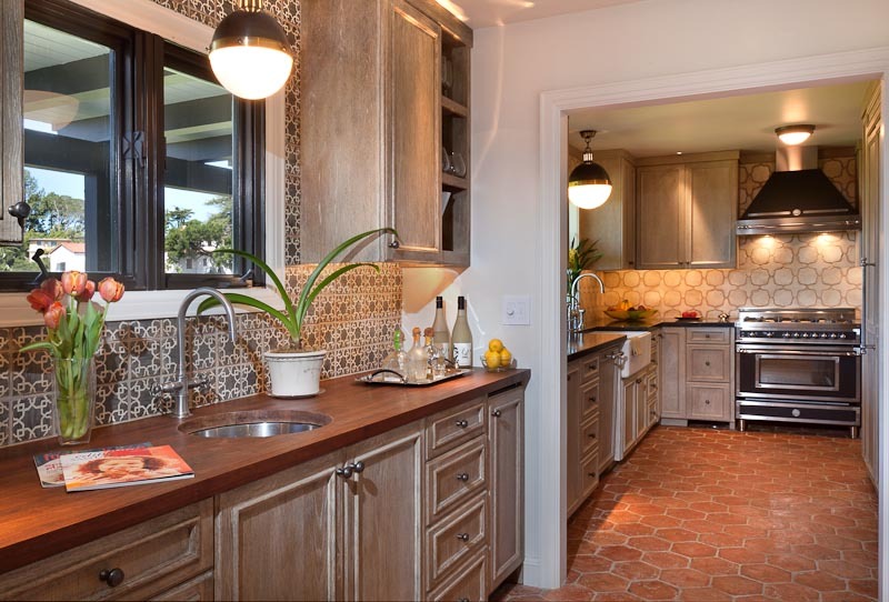 1021 Las Alturas Road Santa Barbara, CA 93103 - Photo 7 of 20 a kitchen with granite countertop a sink and cabinets