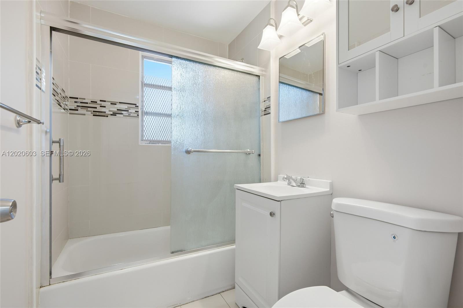 3750 Southwest 27th Street Miami, FL 33134 - Photo 12 of 41 a bathroom with a sink toilet and shower