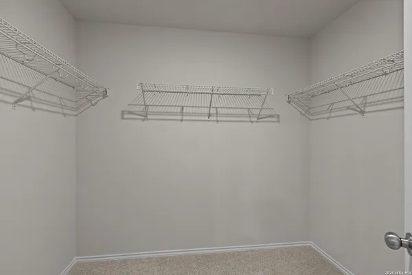 a view of a room with racks on the wall
