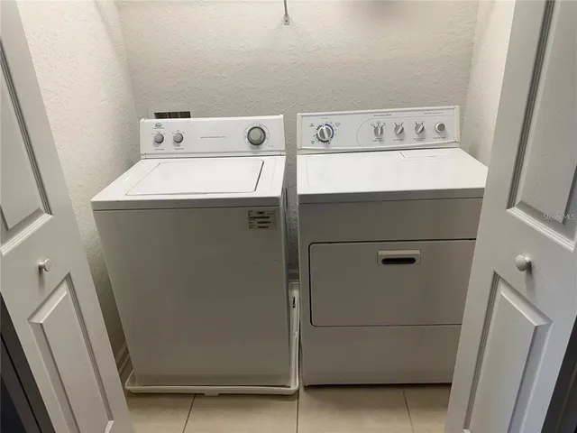 a bathroom with a sink a mirror and a toilet