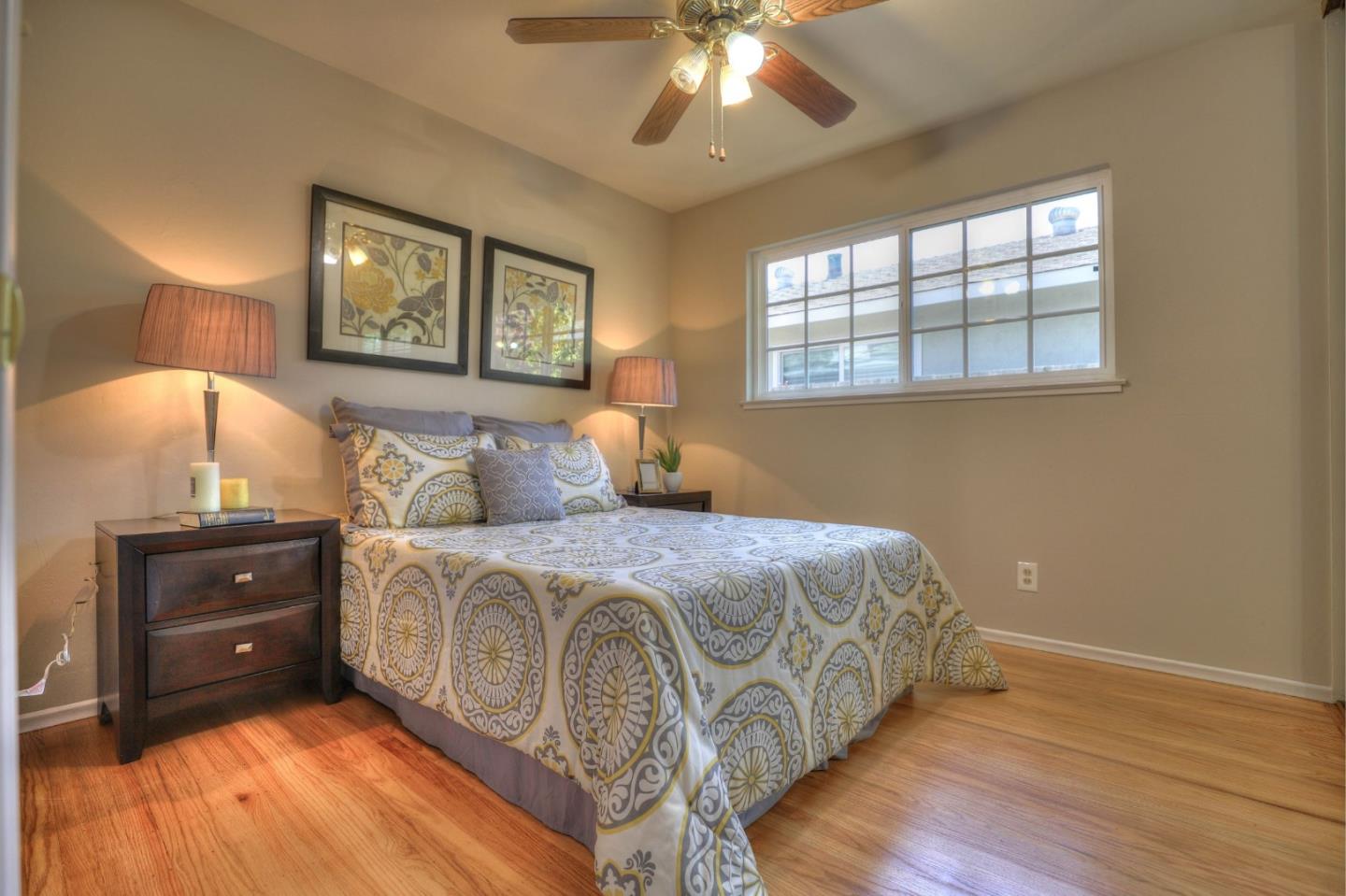 3802 West Rincon Avenue Campbell, CA 95008 - Photo 16 of 21 a bed room with a bed and a lamp