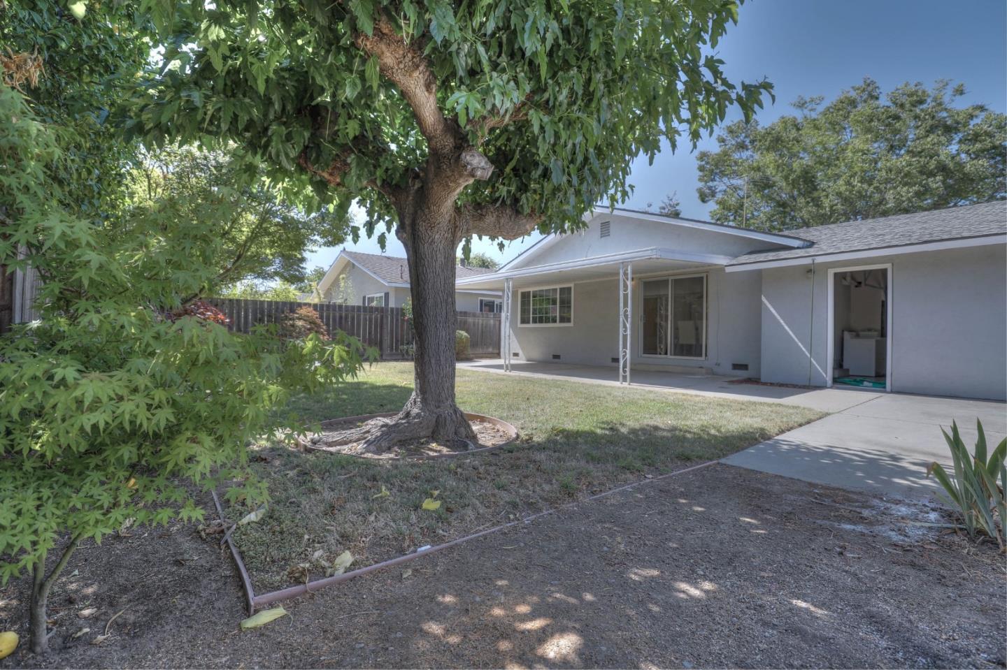 3802 West Rincon Avenue Campbell, CA 95008 - Photo 19 of 21 a front view of a house with a garden