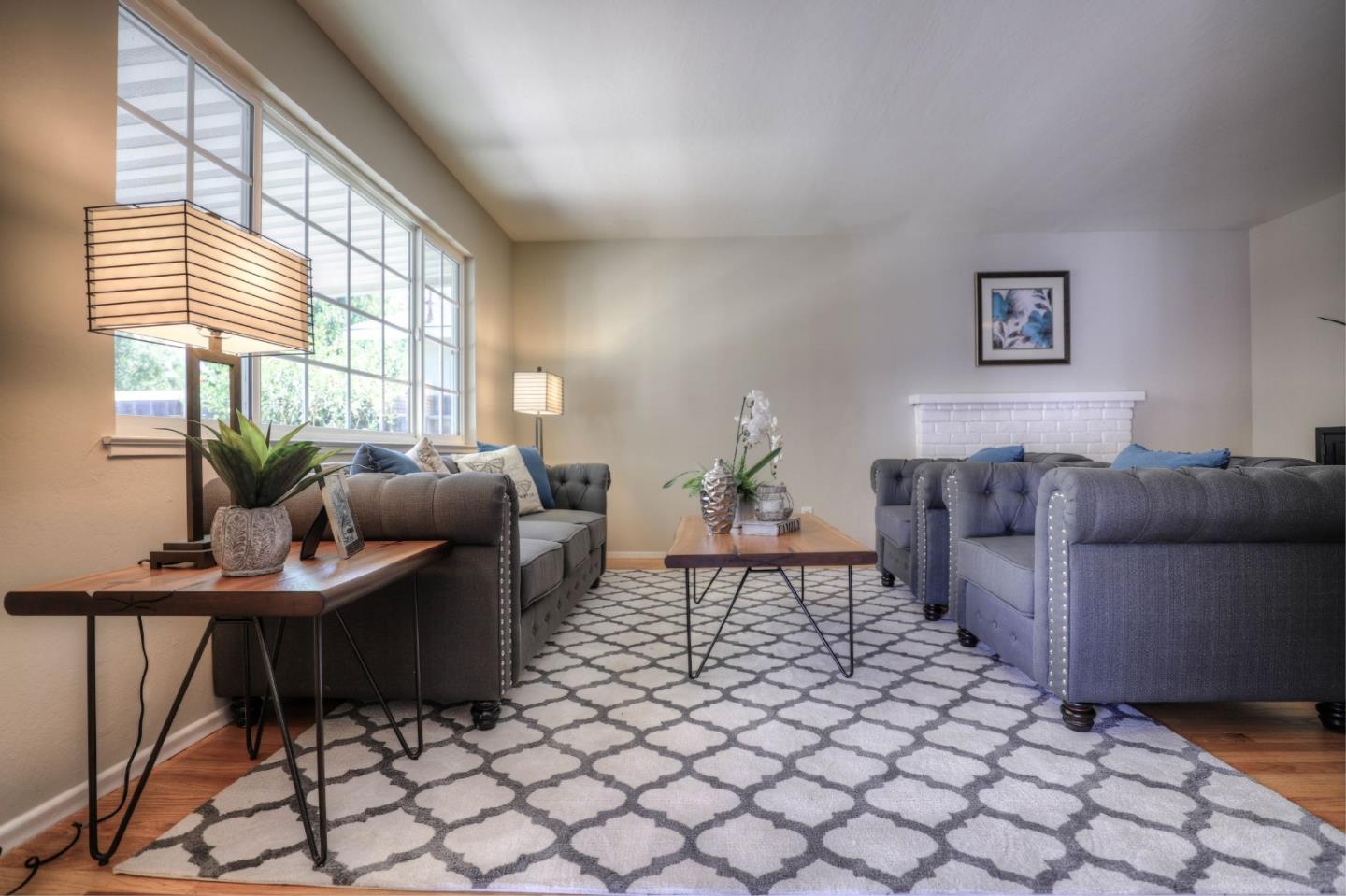 3802 West Rincon Avenue Campbell, CA 95008 - Photo 2 of 21 a living room with furniture and a window