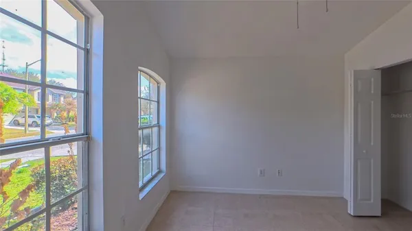 an empty room with windows