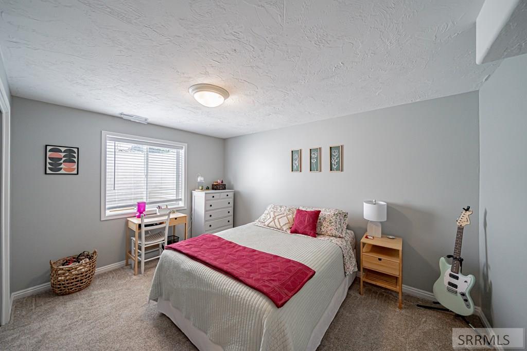 3947 Jordan Circle Ammon, ID 83406 - Photo 65 of 81 Basement Bedroom 1