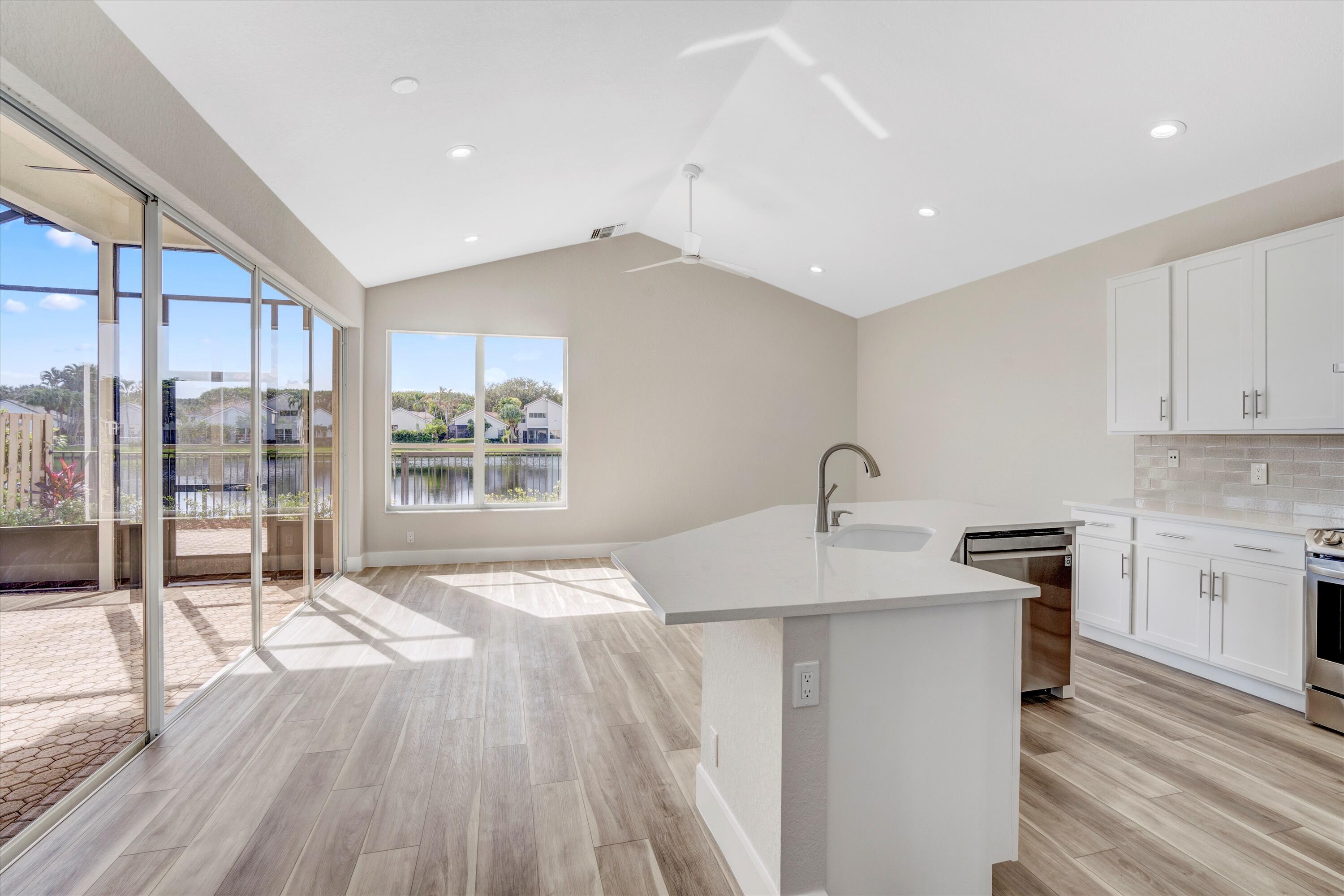 2482 Northwest 67th Street Boca Raton, FL 33496 - Photo 5 of 25 Kitchen / Family Room