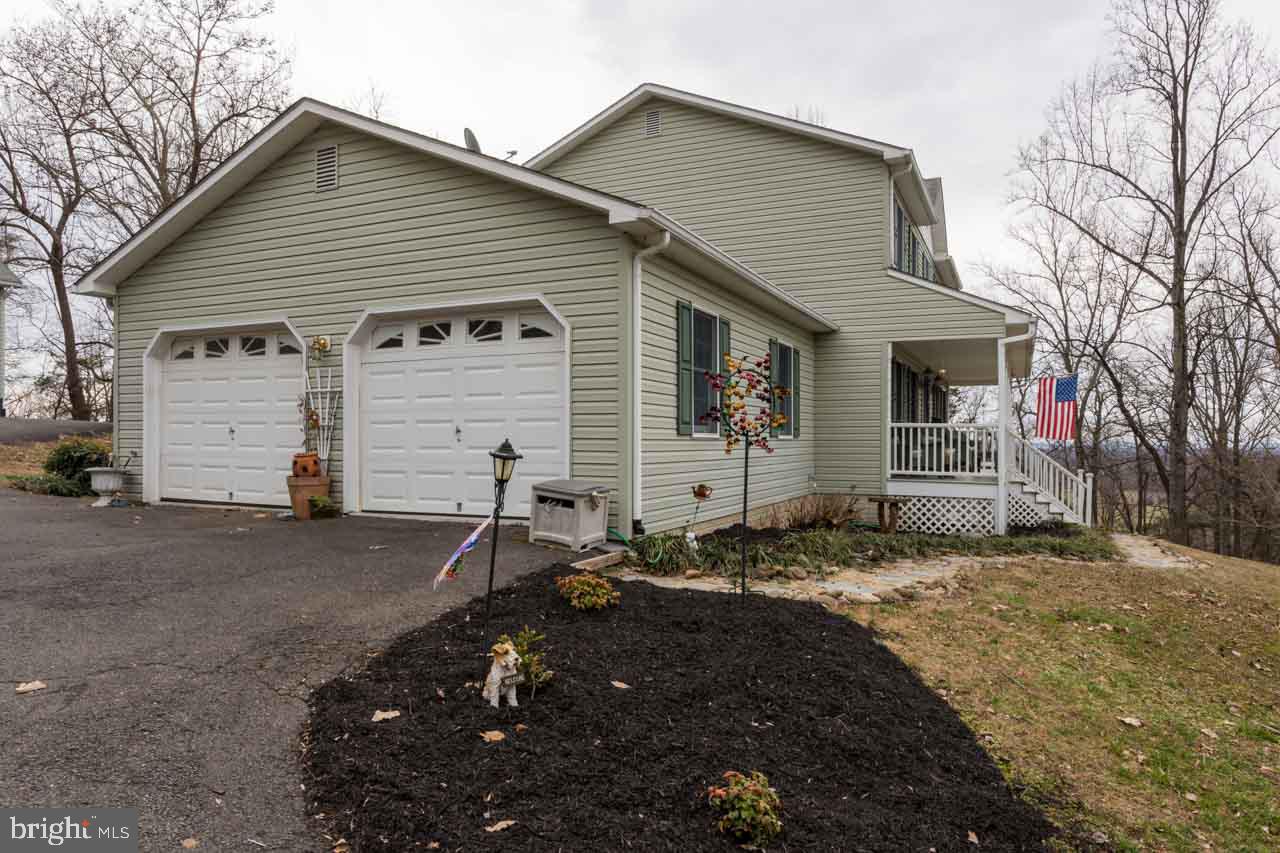 Attached garage.  One of 3 garages, 6 bays total.
