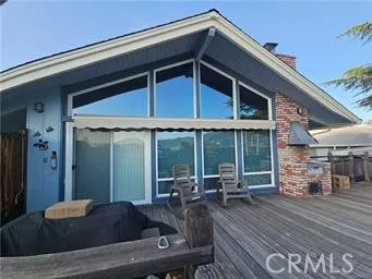 an outdoor view of house with patio