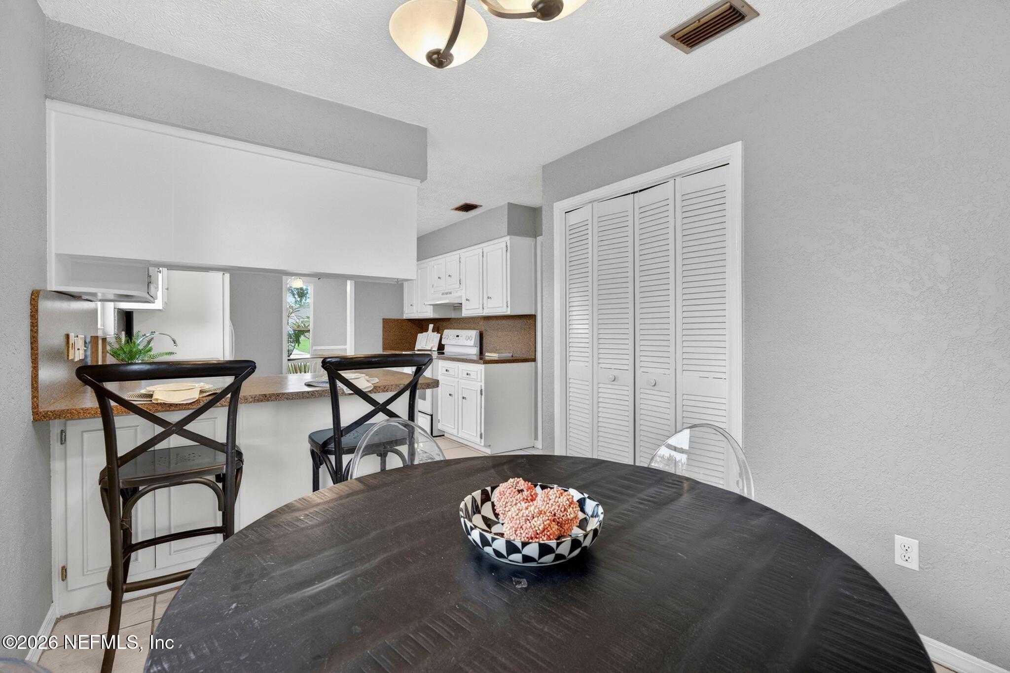 138 Ridgefield Court Orange Park, FL 32065 - Photo 24 of 64 a living room with furniture and wooden floor